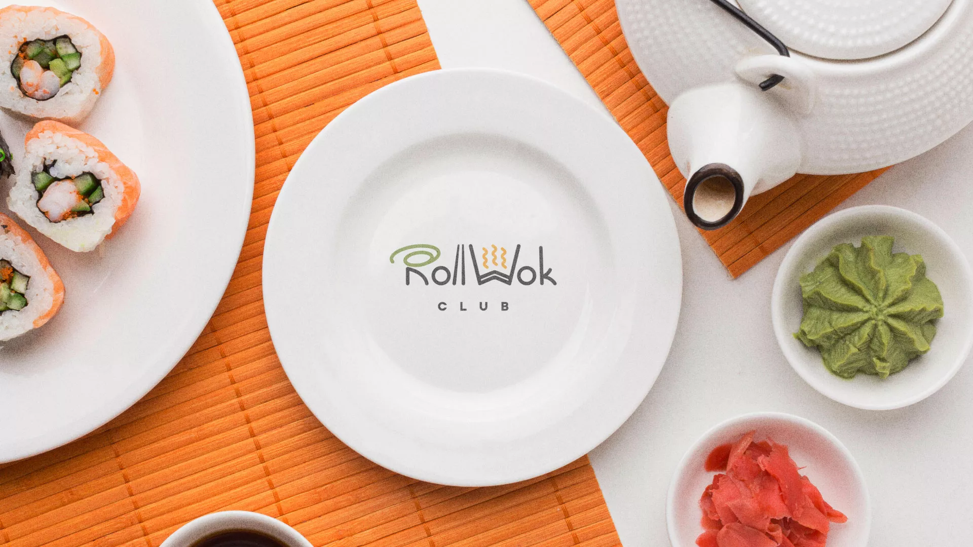 Разработка логотипа и фирменного стиля суши-бара «Roll Wok Club» в Поронайске
